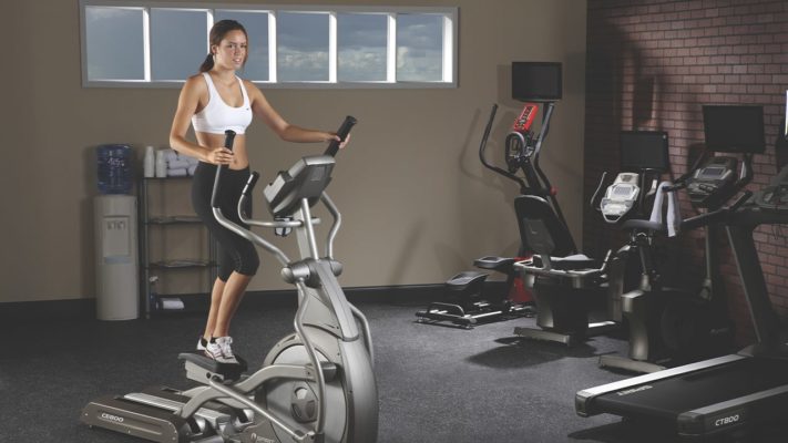 Эллиптический тренажер: польза для организма: фото.