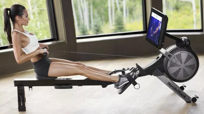 Гребной тренажер: как правильно заниматься: фото.